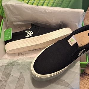 CARIUMA SLIP ON Black Canvas Off-White Logo Sneaker